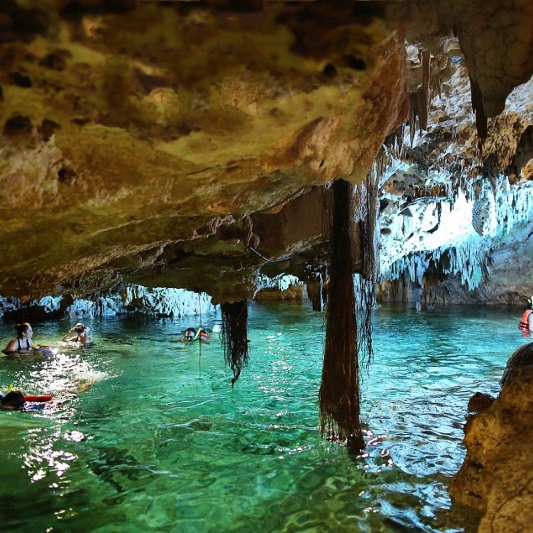 Underground Cenote in Aktun Chen Park to refresh and relax in Tulum, Mexico.