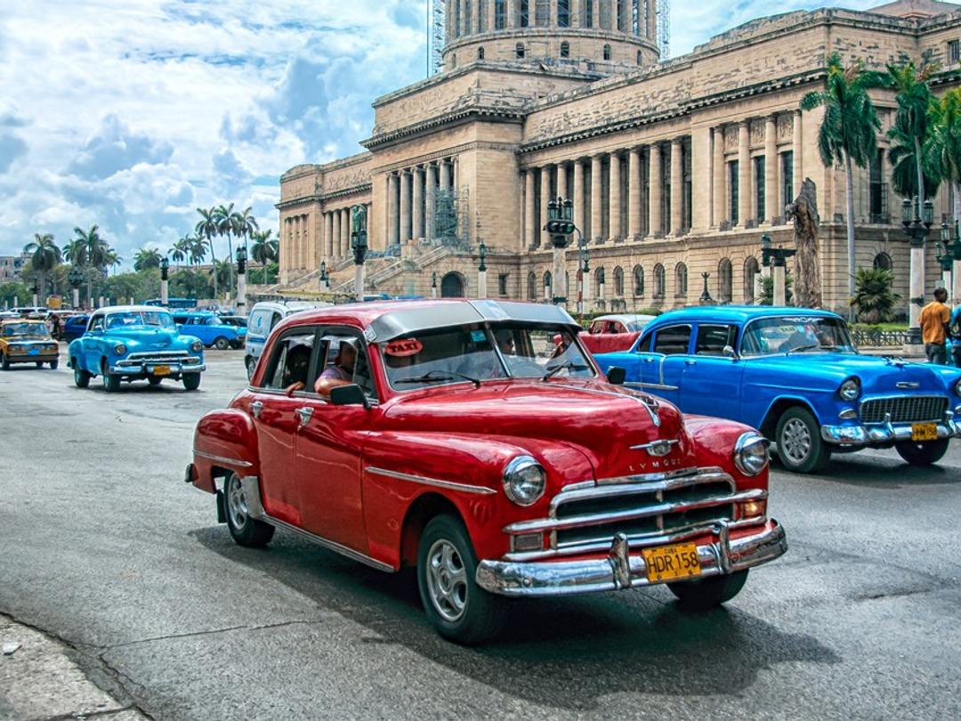 "CANNON SHOT CEREMONY IN AMERICAN CLASSIC CARS (HARD TOP)" Private Tour, Havana, Cuba.