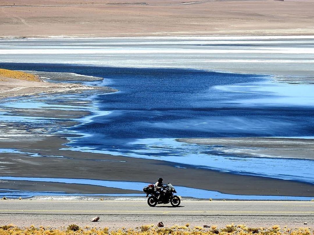 Motorcycle tour,  Atacama salt flat, Antofagasta region, Chile.