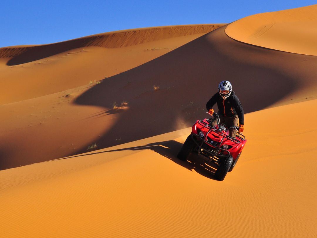 Driving ATV QUAD SAFARI through the Atacama Desert, Antofagasta region, Chile