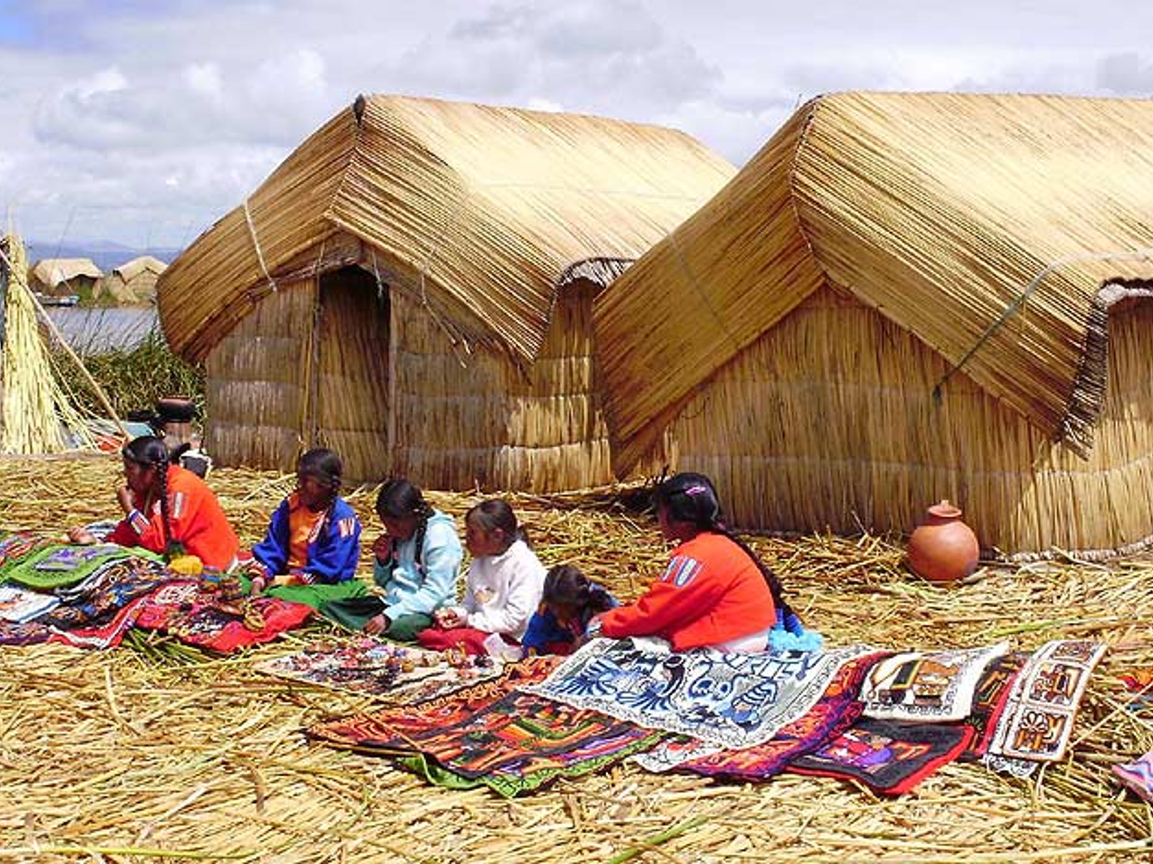 ISLAS LOS UROS & TAQUILE FULL DAY TOURS. Uros Floating Islands, Peru