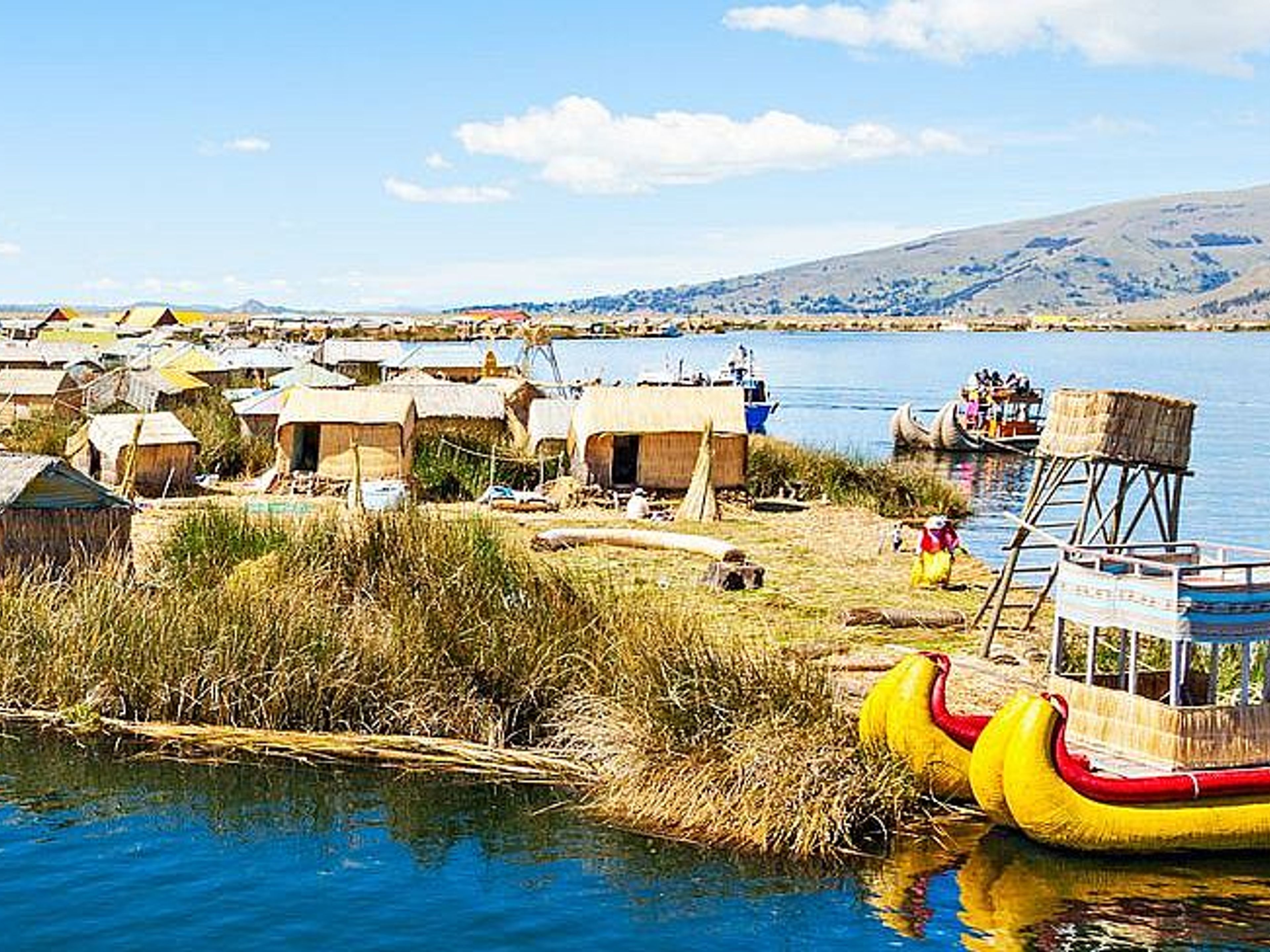 ISLAS LOS UROS & TAQUILE FULL DAY TOURS. Uros Floating Islands, Peru