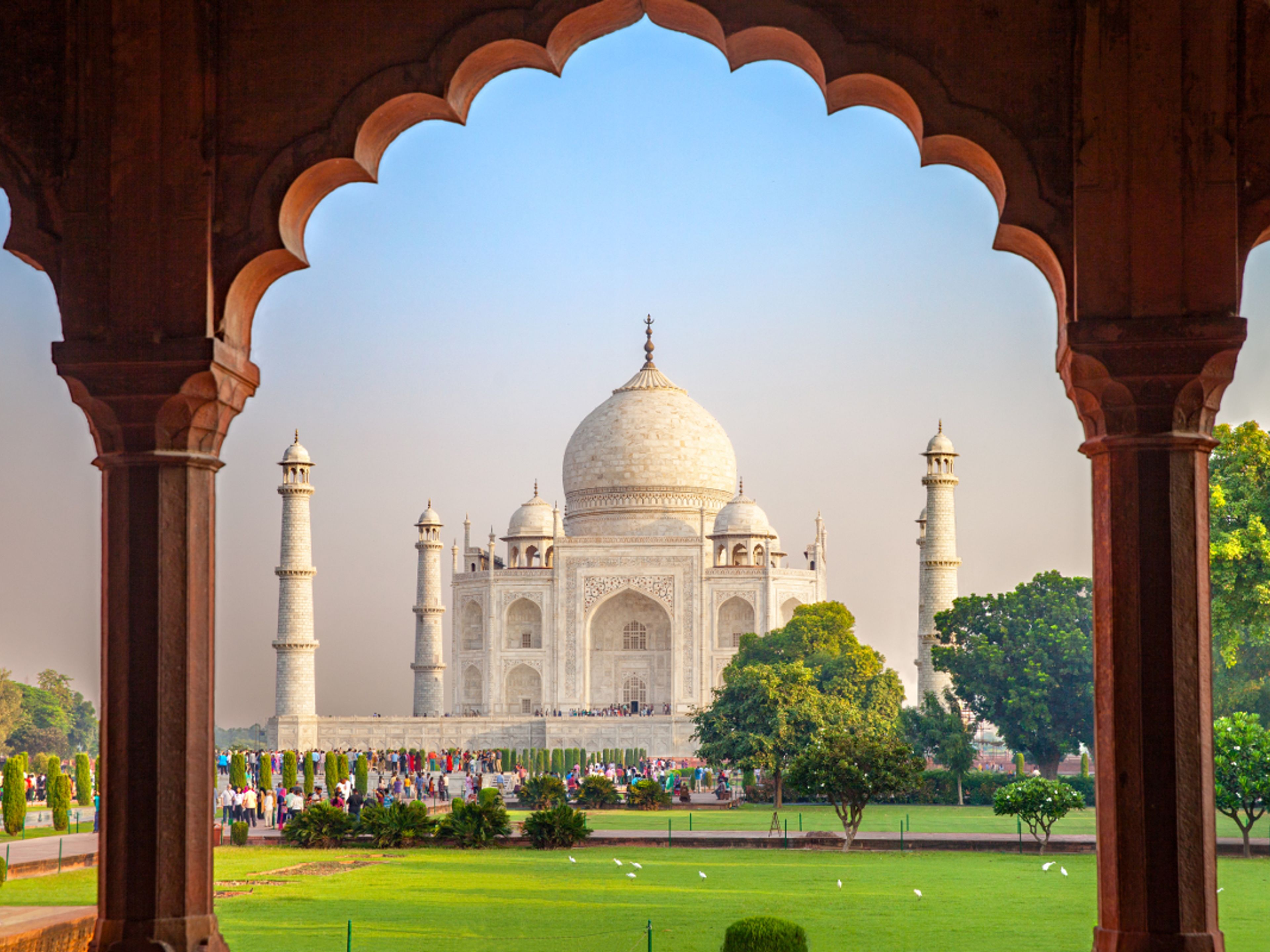 "All Inclusive Ultimate Walking Tour Of Agra SmartPass offering 12 + Attractions" Tour. The Taj Mahal (Crown of the Palace or Corona de los palacios) panoramic view. An ivory-white marble mausoleum in the Indian city of Agra, Uttar Pradesh, India.