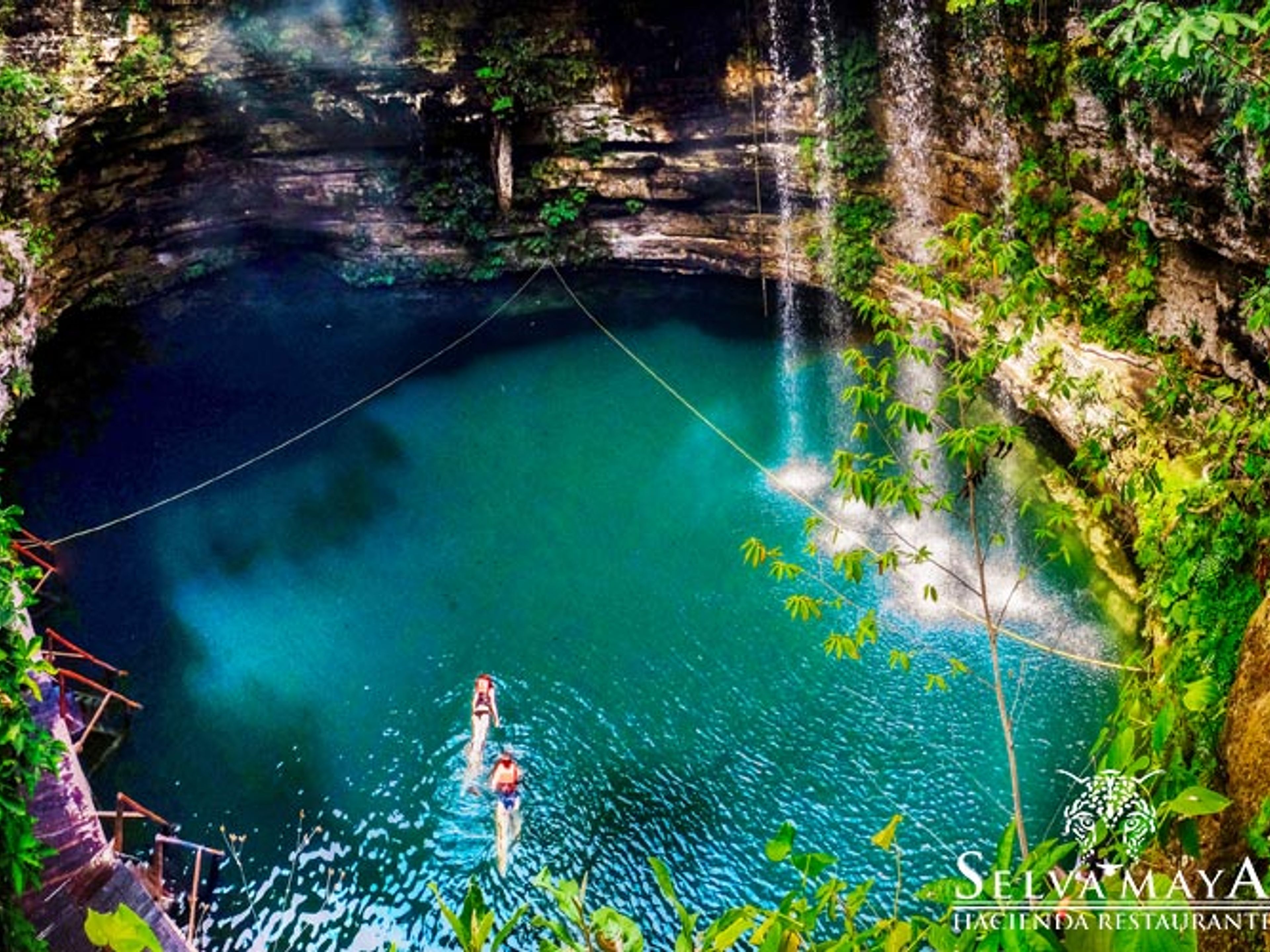 "Chichen Itza Plus" Tour. Cenote Rio Maya fresh and clear waters in  Chichen Itza, Yucatan Peninsula. Mexico.
