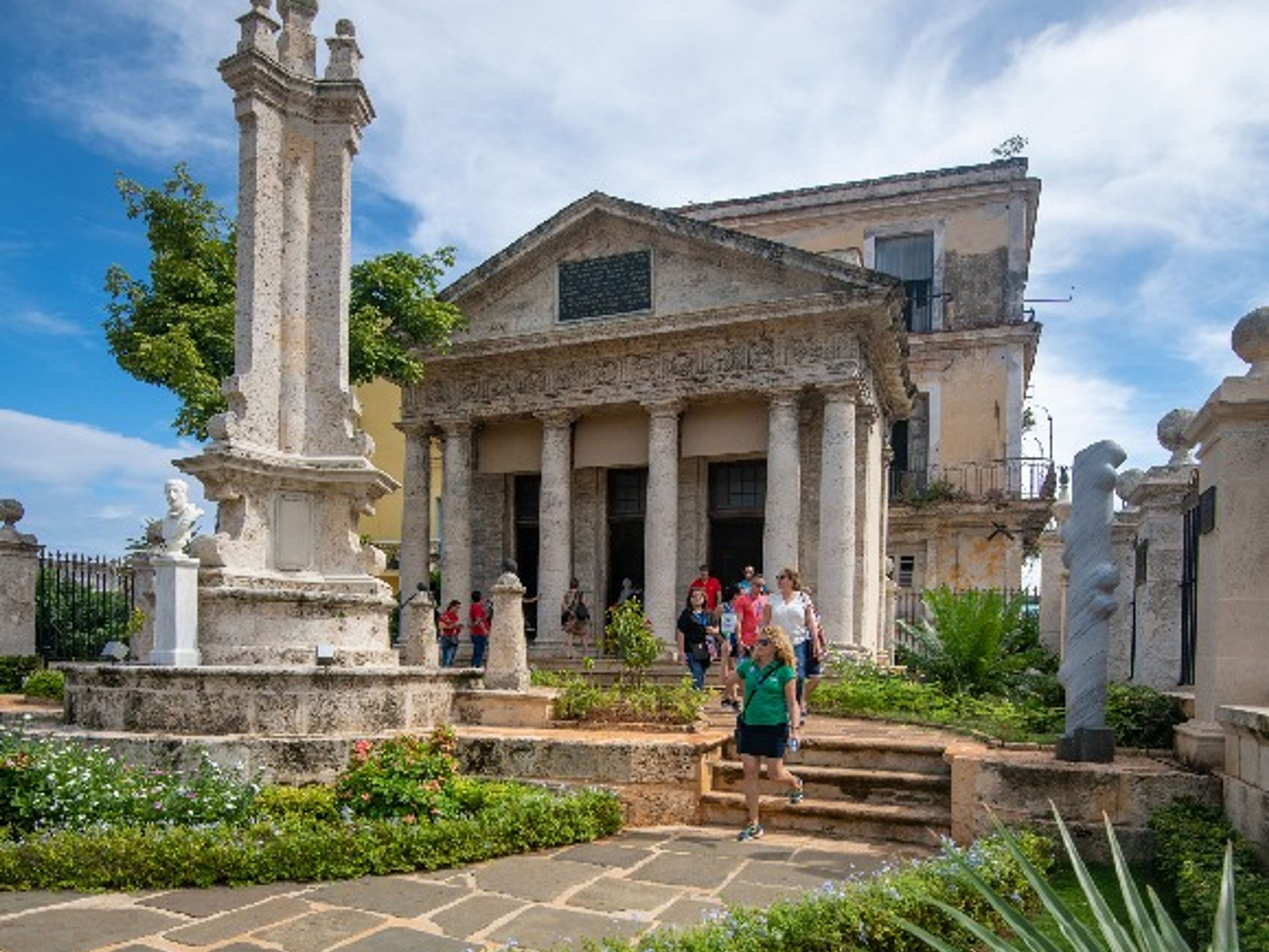 Servicios de Traslados Colectivos “EL EXPRESO DE CUBA: SANTIAGO DE CUBA / HOLGUÍN / CAMAGÜEY / CIEGO DE ÁVILA / HABANA”. El Templete monument panoramic view, Old Havana, Havana, Cuba.