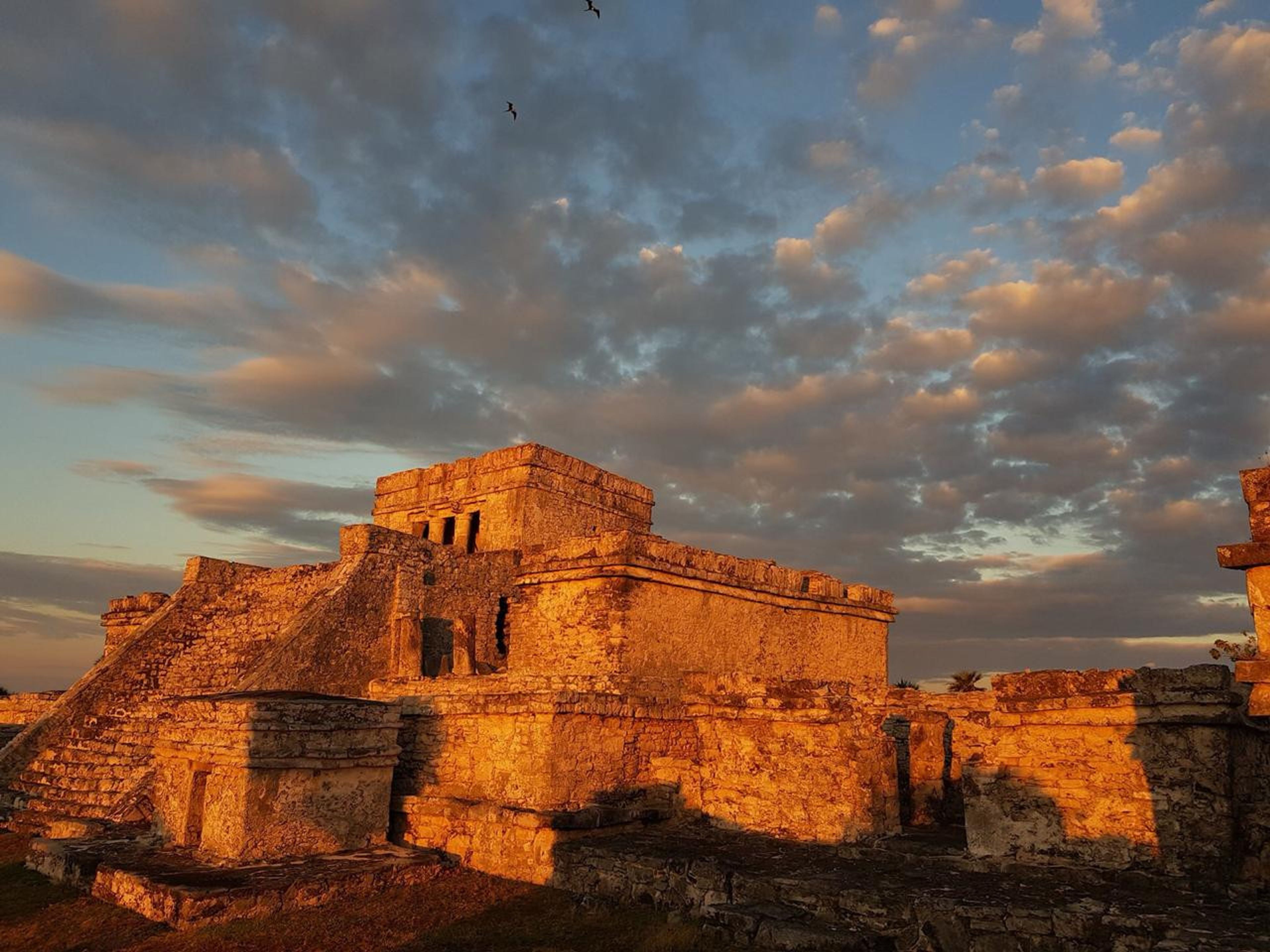 "Tulum + Playa del Carmen Plus" Tour. Pyramid "El Castillo" in Tulum Archaeological Zone. Tulum, Mexico.