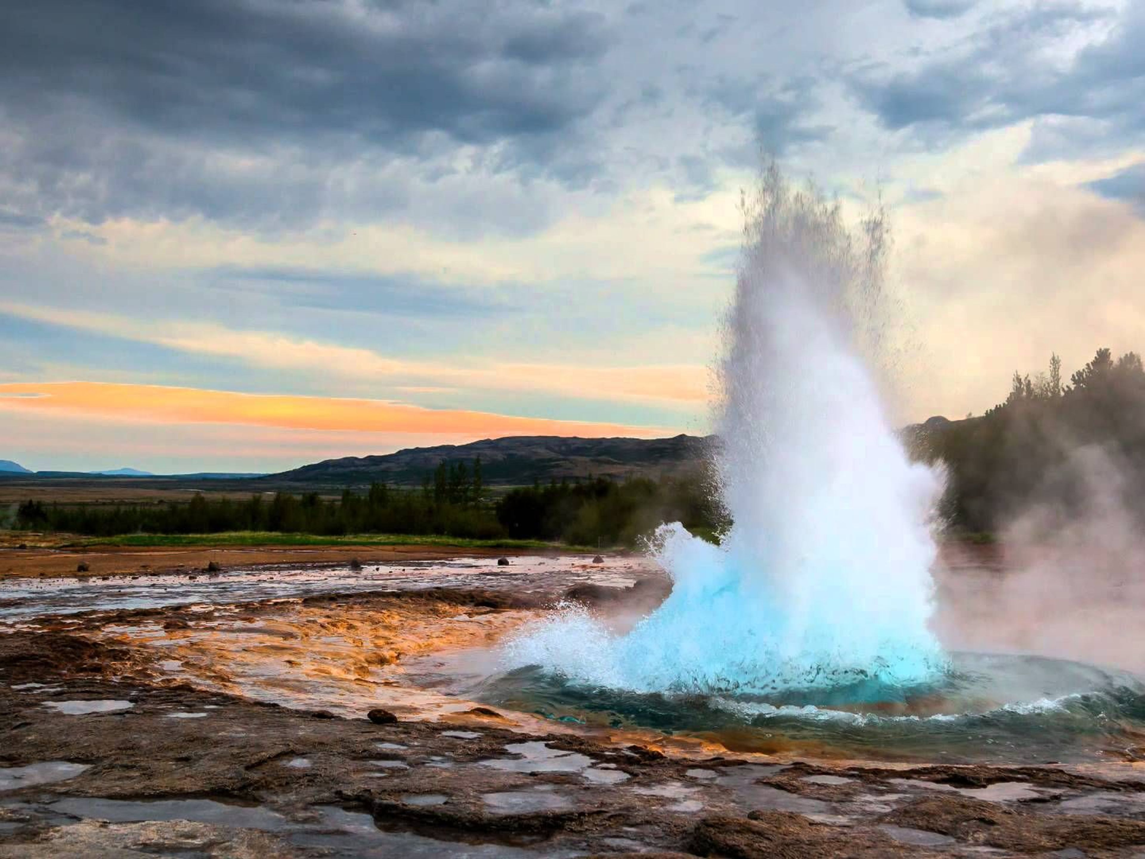 "GOLDEN CIRCLE + SECRET LAGOON" Private Tour. The Great Geysir, a hot spring in a geothermal area in Haukadalur Valley, Iceland.