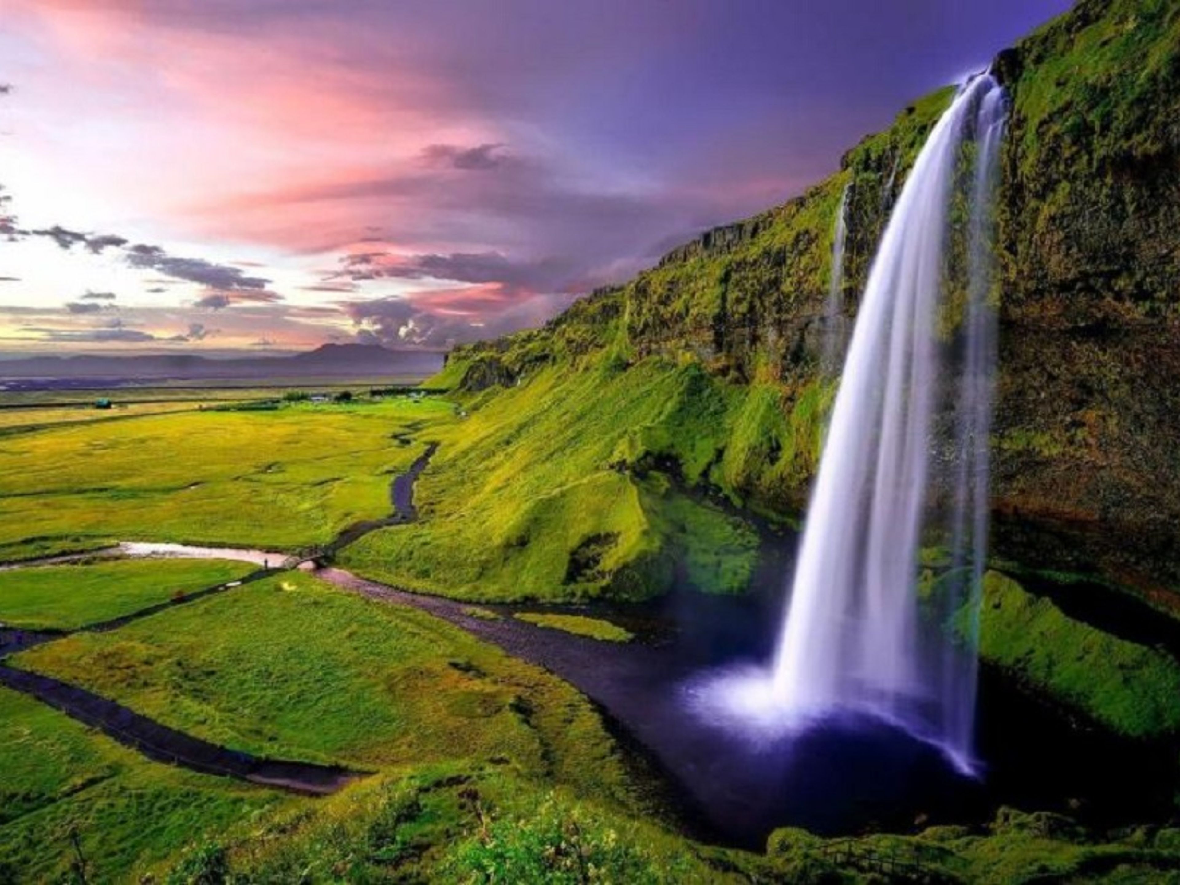 Excursión privada "LAGUNA GLACIAR DE JÖKULSÁRLÓN + COSTA SUR + PASEO EN BARCO ZODIAC POR LA LAGUNA GLACIAR FJALLSÁRLÓN". Seljalandsfoss waterfall panoramic view, Iceland.