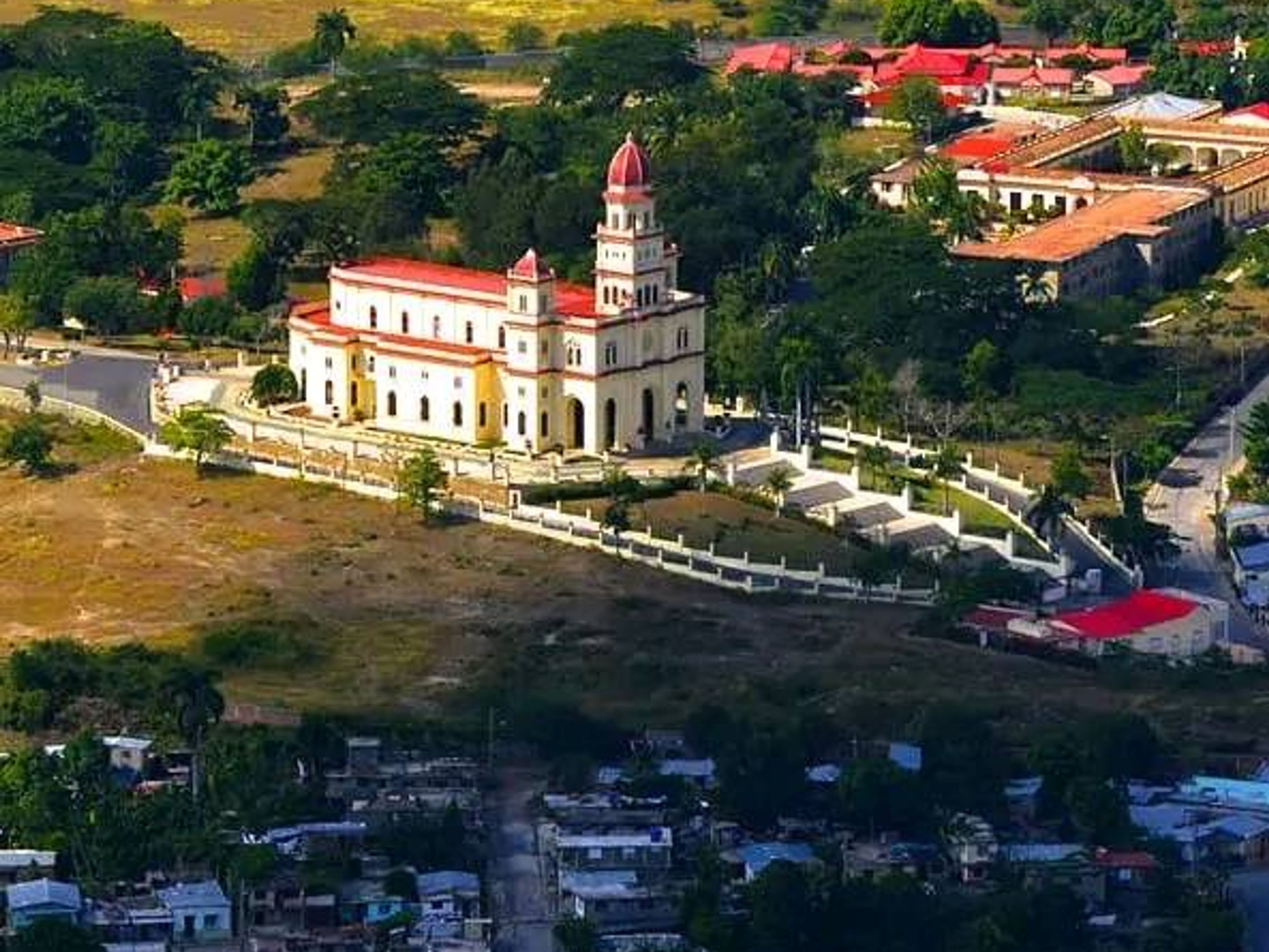 "VISIT TO THE STEEL BAND PROJECT IN THE COMMUNITY OF EL COBRE" Tour. The Santuary of La Virgen de la Caridad del Cobre panoramic view, El Cobre, Santiago de Cuba, Cuba.