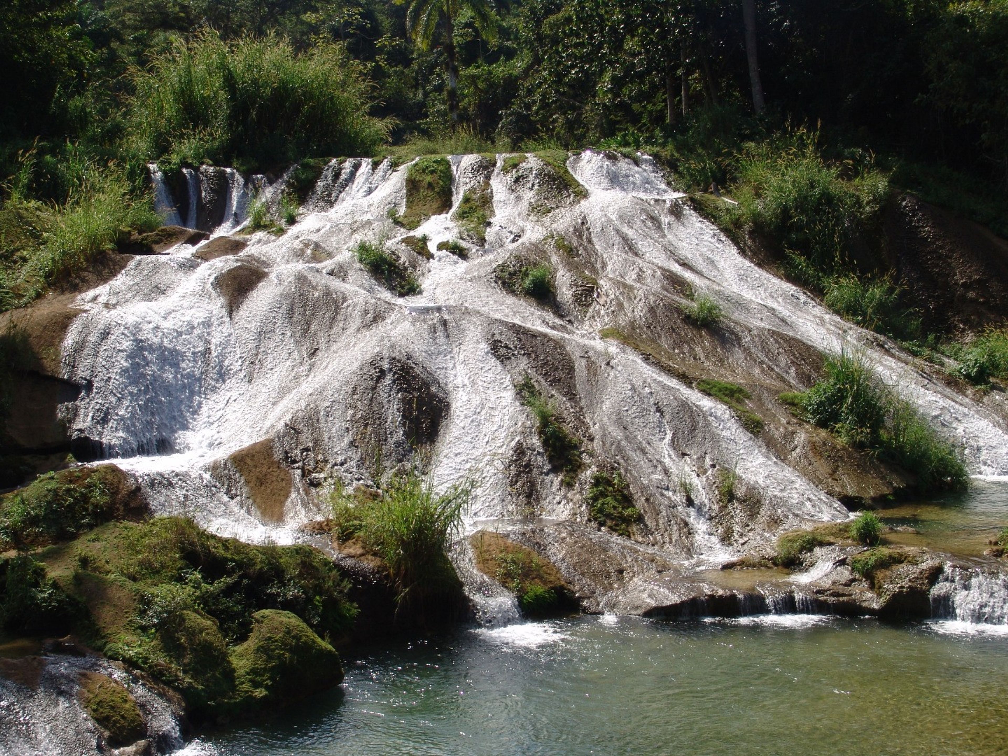 Jeep Safari “NATURE TOUR NICHO - TRINIDAD”. Natural pool at El Nicho Water Falls, Topes de Collantes natural park.