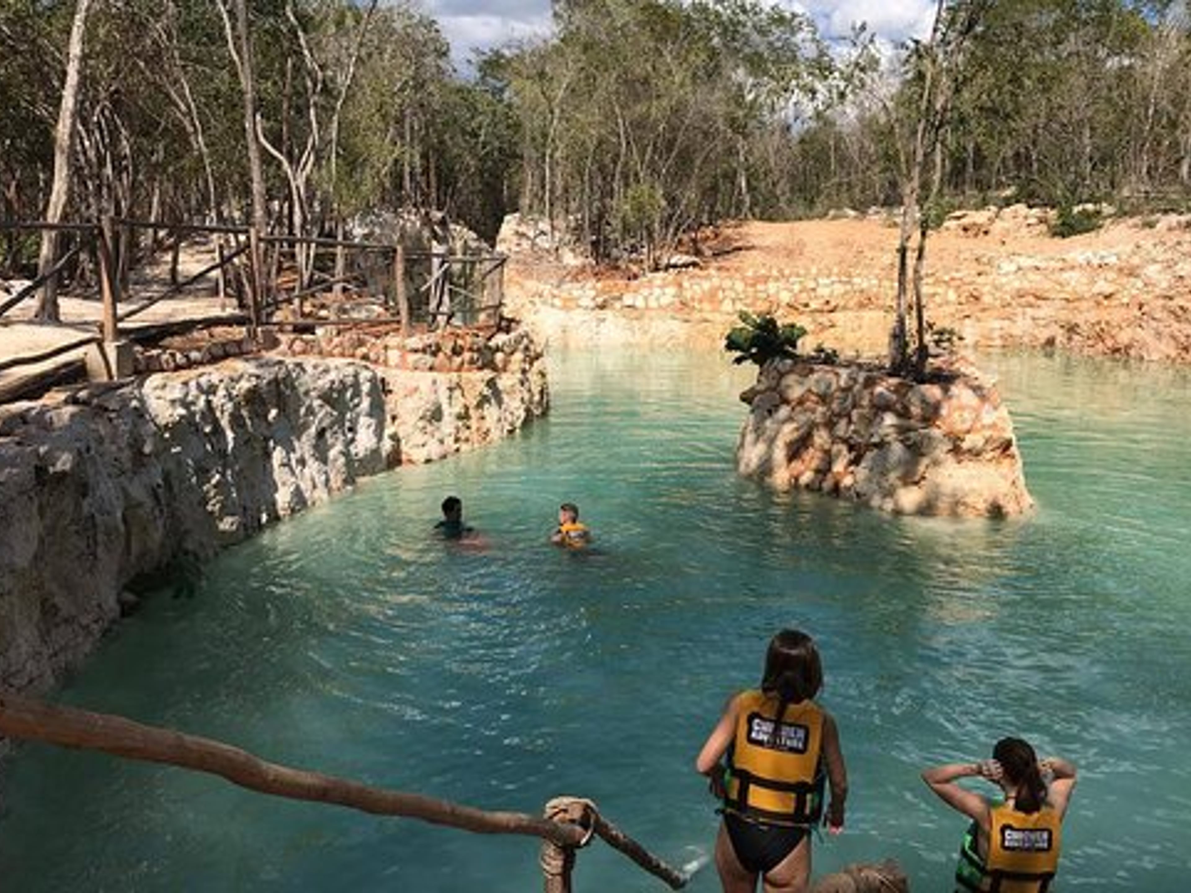 "Chichen Adventure  ATV" Tour. Artificial Cenote Rio Maya fresh and clear waters in Chichen  Adventure Park. Chichen Itza, Yucatan Peninsula. Mexico.