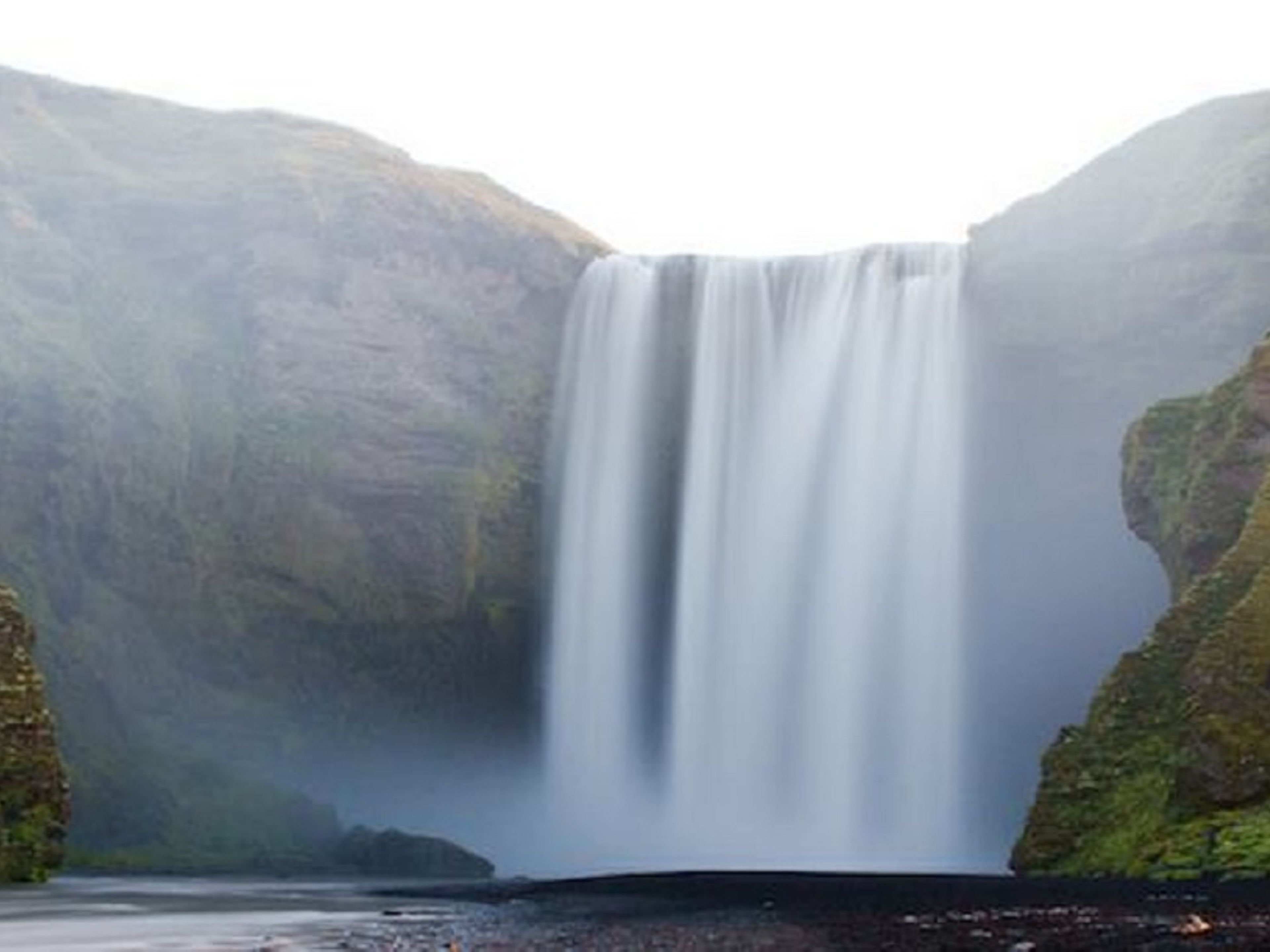 Tour privato "LAGUNA GLACIALE DI JÖKULSÁRLÓN + COSTA SUD + GROTTA DI GHIACCIO KATLA VETRO DEL DRAGONE". Skogafoss waterfall panoramic view, Iceland.