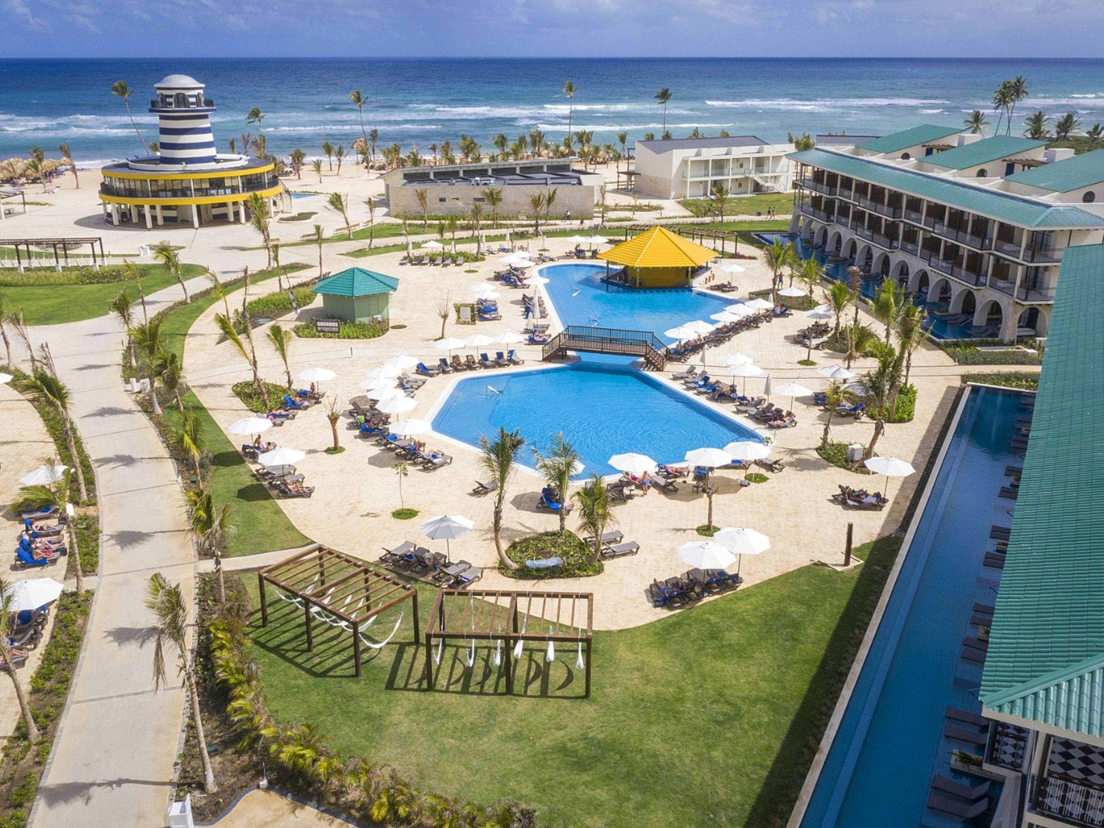 Hôtel OCEAN EL FARO.Hotel's pool panoramic view.