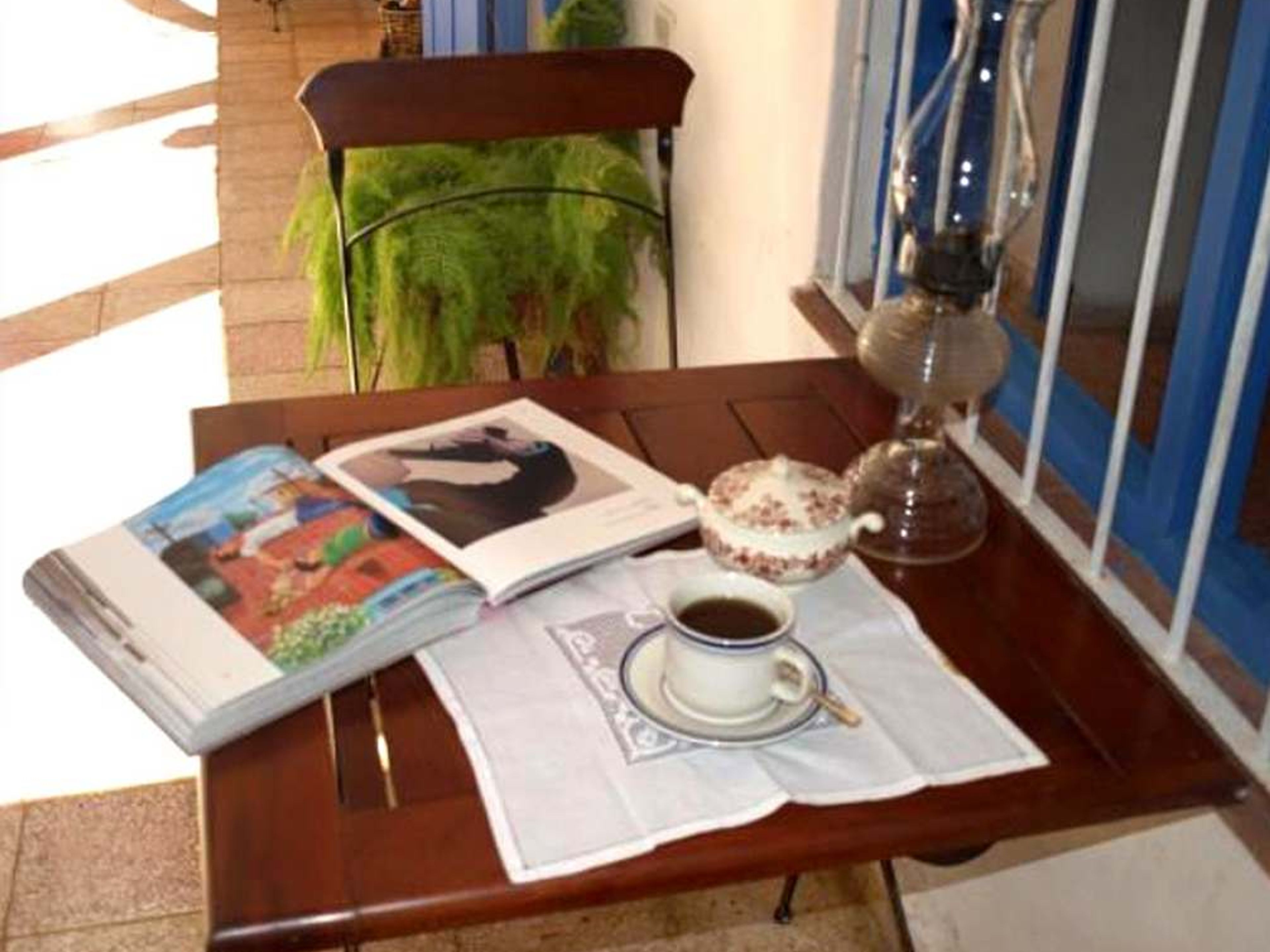 Hostal Buscando a Caniqui, CALLEJÓN DEL OLVIDO (Santiago Escobar) No. 169House's breakfast and dinner areas