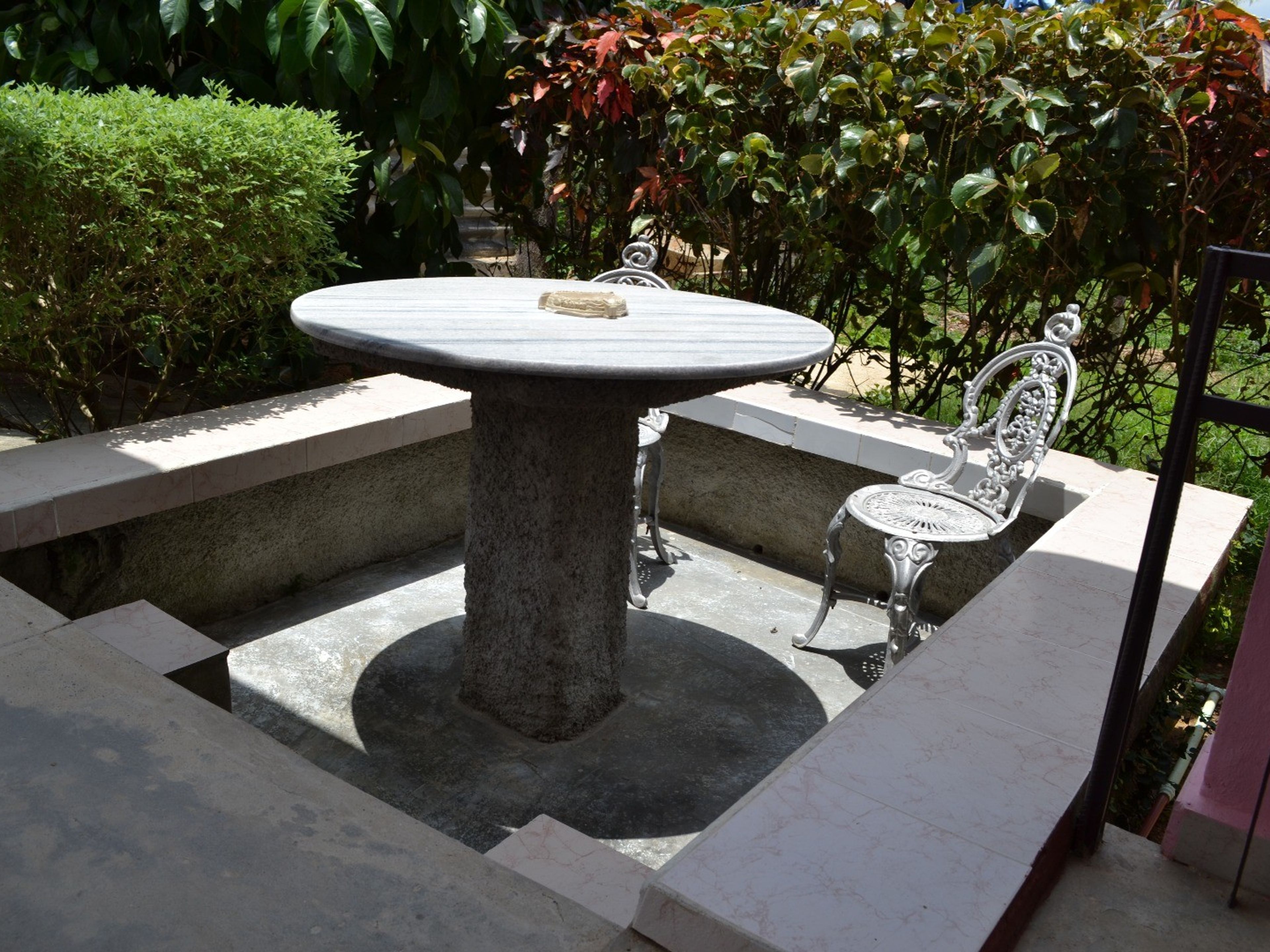 Mirelia House, Km 25Inside patio view