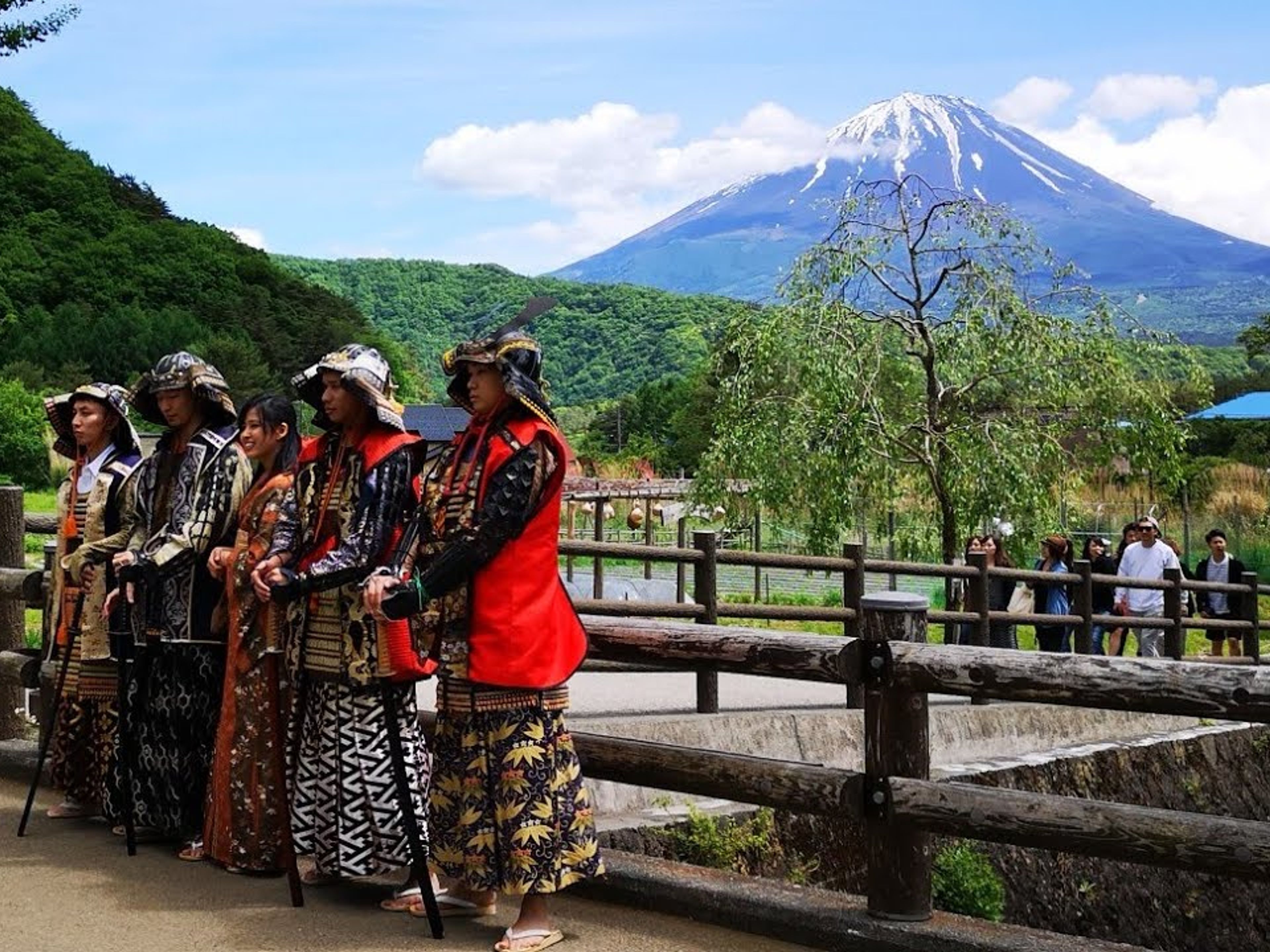 Four japanese man with traditional warrior dress in SAIKO IYASHI NO SATO NENBA, Kansai (or Kinki) region (west-central part), Japan.