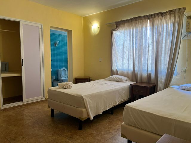 CONDOMINIO SULLA SPIAGGIA (9 camere con bagno privato)