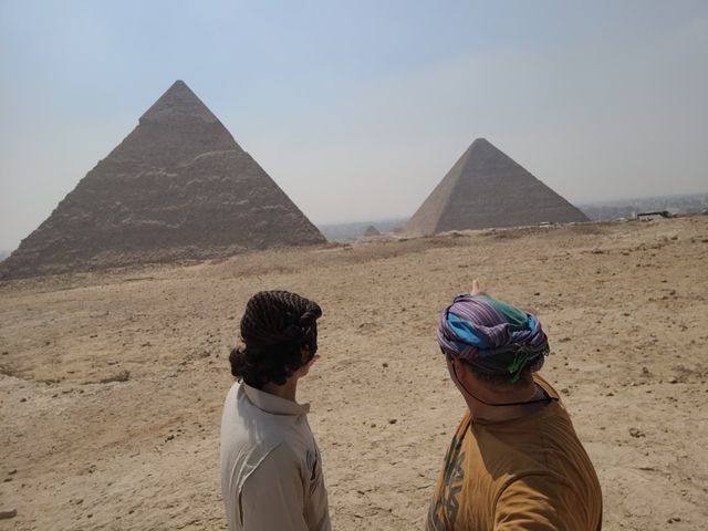 The Pyramids of Giza are a massive ancient complex on the outskirts of Cairo, Egypt.