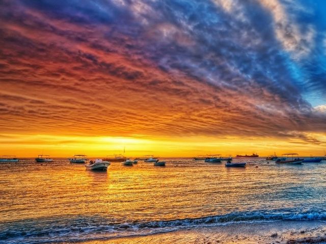 Sunset at Playa del Carmén beach panoramic view, México