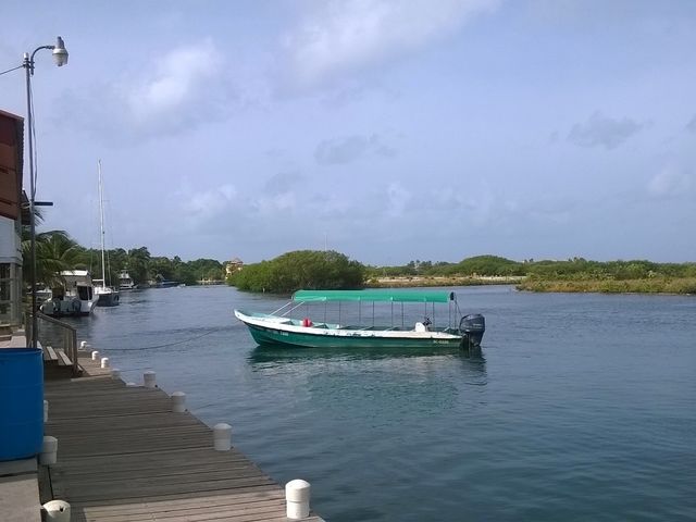 Water taxi arriving at Mango Creek, Caye Caulker, Belize