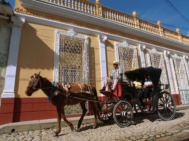 Canter by horse and cart through the streets of Trinidad