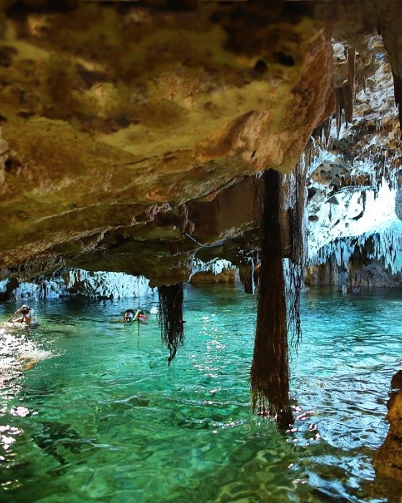 Underground Cenote in Aktun Chen Park to refresh and relax in Tulum, Mexico.