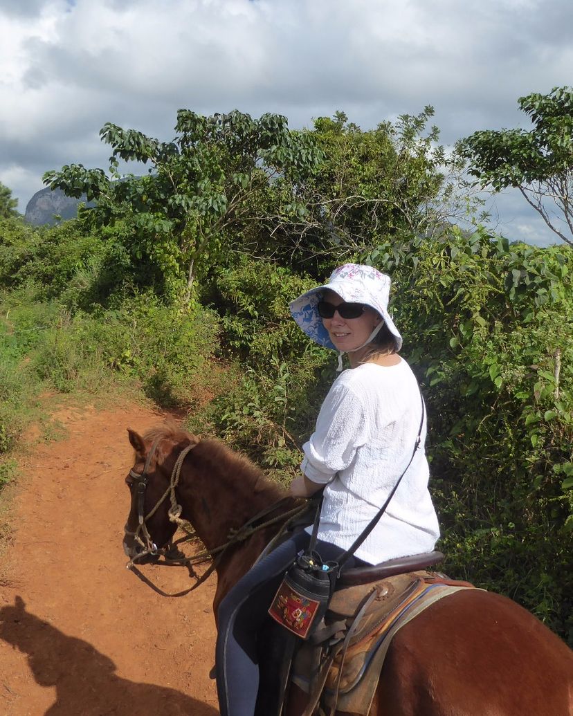 Horseback Riding Through the Valle de Palmarito, Viñales valley National Park, declared a Cultural Heritage Site by UNESCO, Pinar del Río