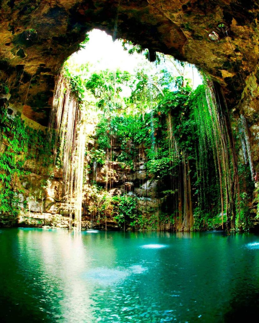 Cenote Rio Maya fresh and clear waters in Chichen Itza, Yucatan Peninsula. Mexico.