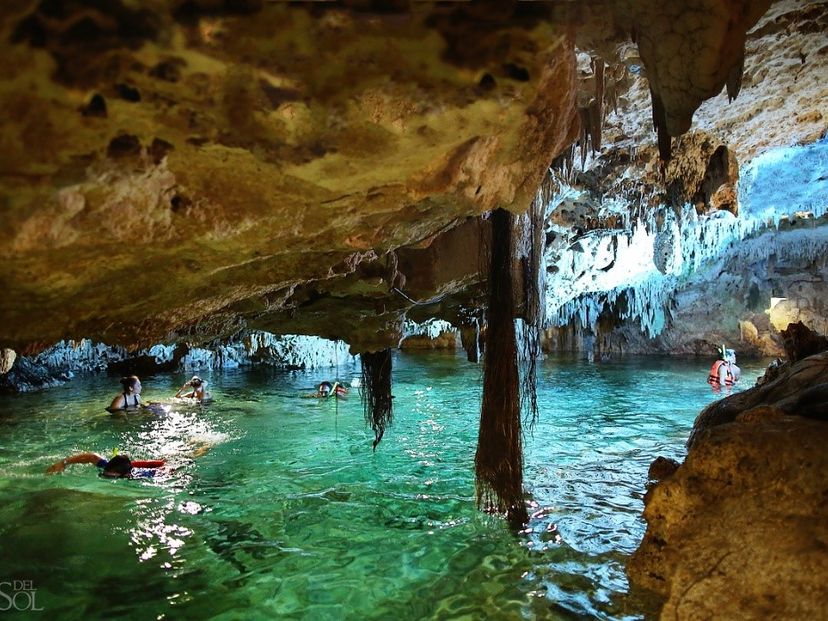 Underground Cenote in Aktun Chen Park to refresh and relax in Tulum, Mexico.