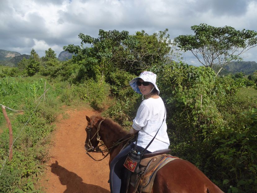 Horseback Riding Through the Valle de Palmarito, Viñales valley National Park, declared a Cultural Heritage Site by UNESCO, Pinar del Río